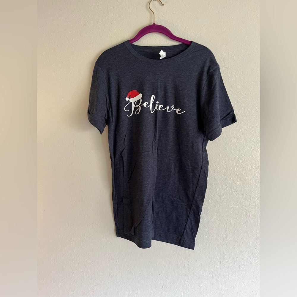 Women’s size medium Bella and Canvas holiday t-shirt.